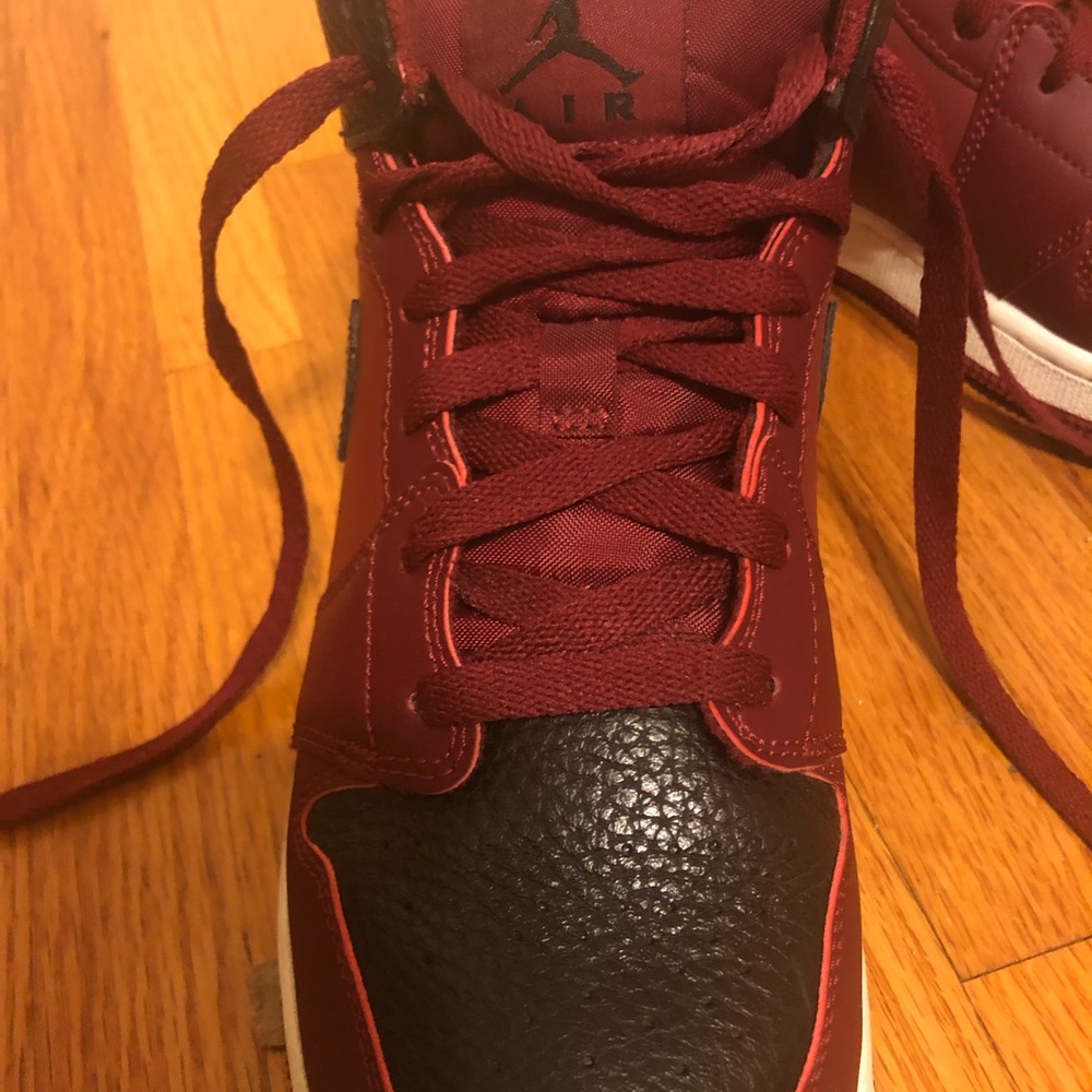 Mid top Jordan 1s